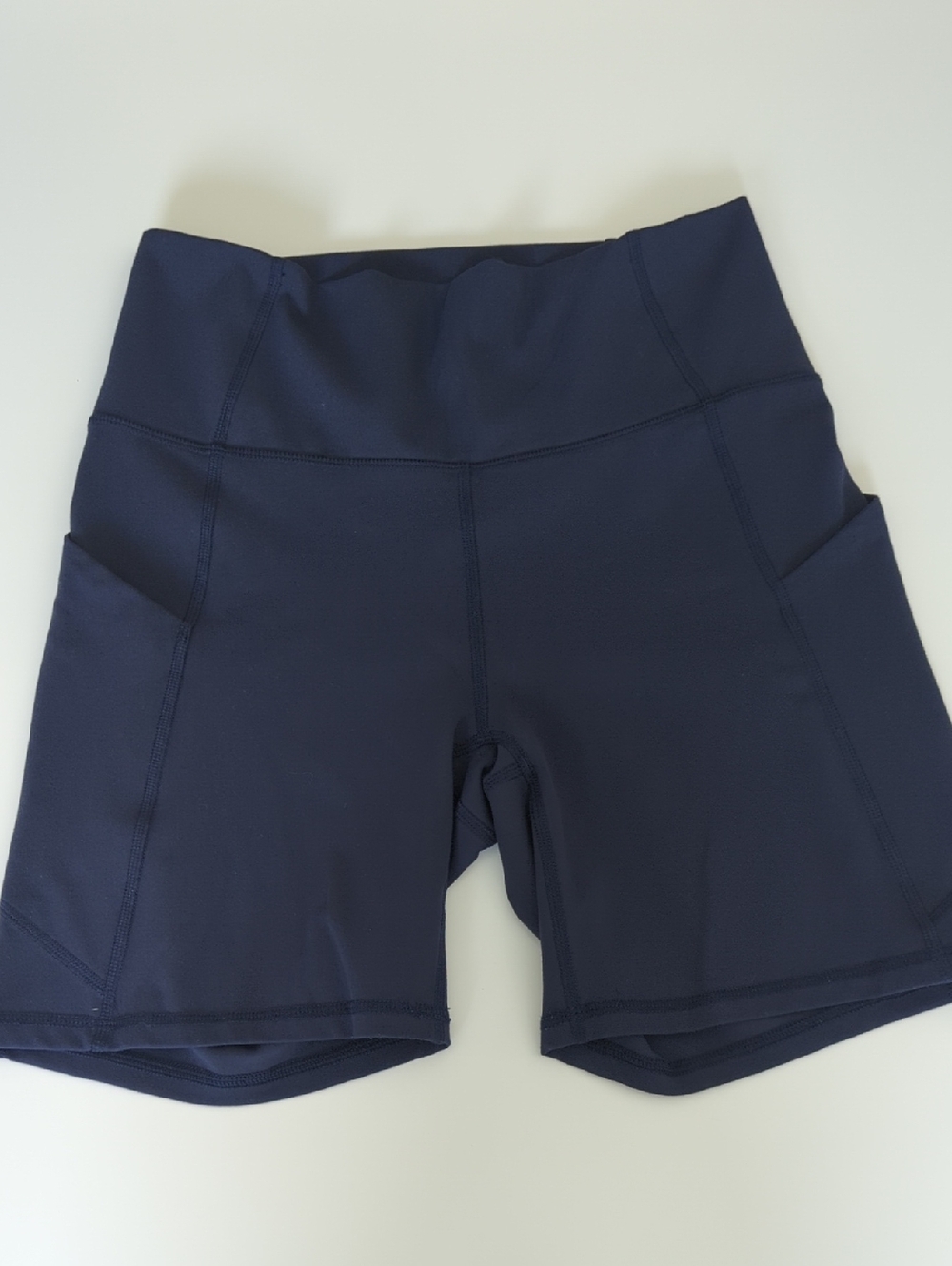 Fabletics Navy High-Rise Bike Shorts with Side Pockets